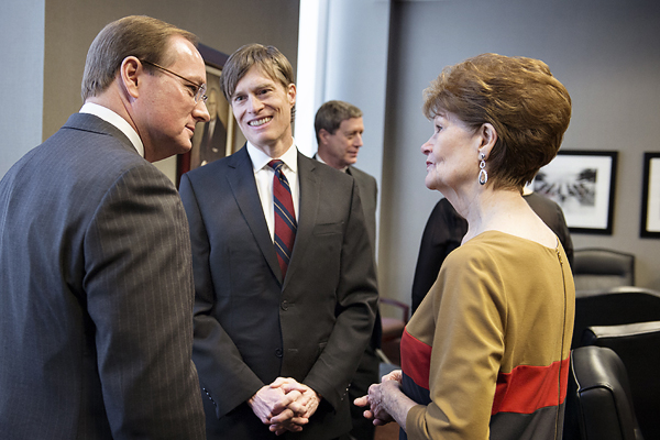 MSU President Mark E. Keenum visits with Eric Zacharias and Mrs. Tommie Zacharias after the campus memorial service for their father and husband, the late MSU President Emeritus Donald W. Zacharias.