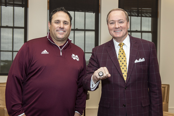 MSU Baseball Coach Lemonis presents President Keenum with a ring to commemorate the Diamond Dawgs’ run to the World Series