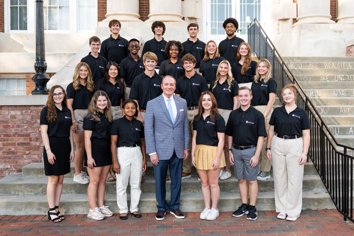 MSU’s fall 2023-24 class of Presidential Scholars pose on the steps of historic Lee Hall with MSU President Mark E. Keenum.