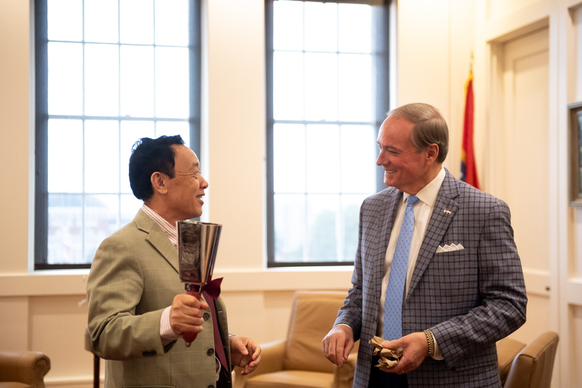 Mississippi State President Mark E. Keenum, right, welcomes Qu Dongyu, Director General of the Food and Agriculture Organization