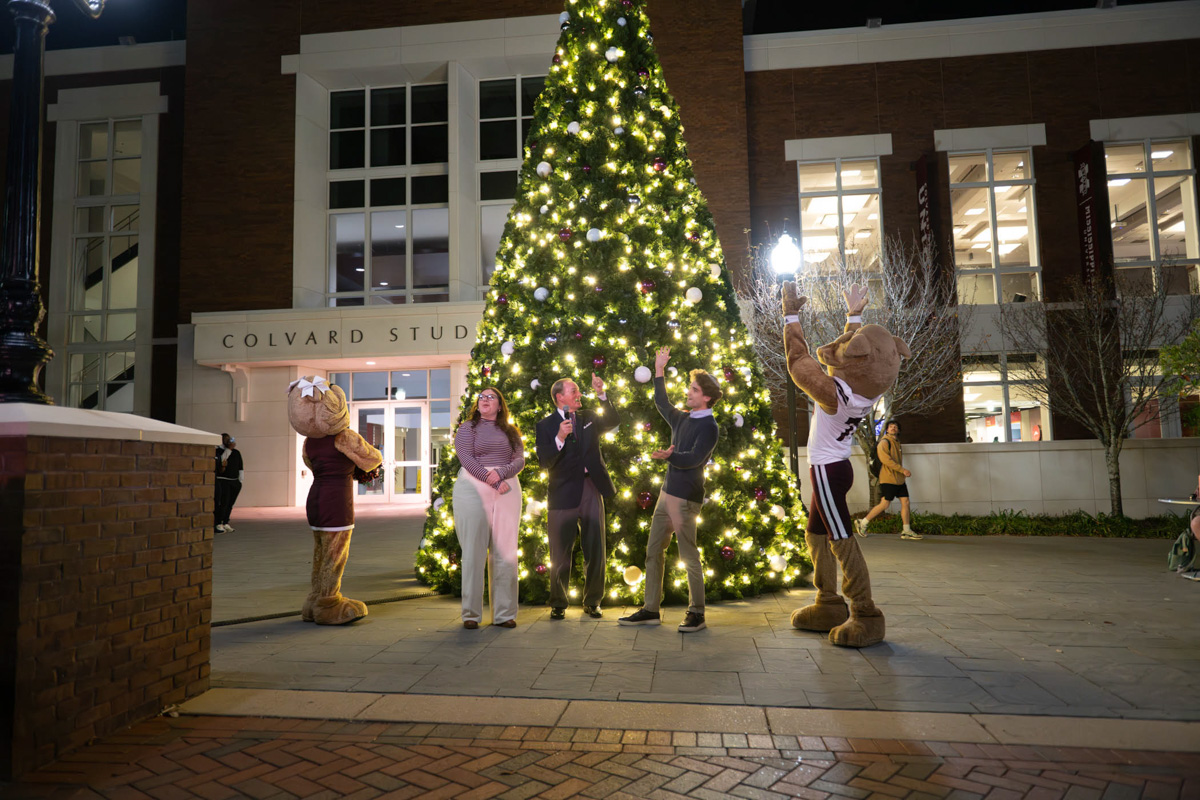 MSU President Mark E. Keenum joined MSU students in a ceremonial lighting of the Christmas tree and menorah in front of Colvard 