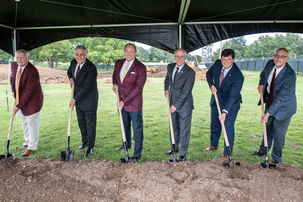 MSU Leaders prepare to toss shovels of earth at the new Music Building groundbreaking.