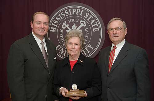 Frances Coleman (center), dean of the Mississippi State Libraries, recently was honored for her service and leadership by the G.V. "Sonny" Montgomery Foundation with its Excellence in Leadership Award.