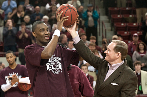 President Keenum presented forward Jarvis Varnado with a game ball in a post-game celebration at Humphrey Colliseum on Wednesday, Feb.