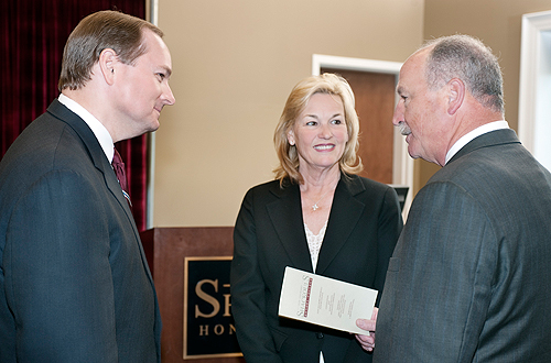 President Keenum swapped medallions with Judy and Bobby Shackouls at an award ceremony at the Shackouls Honor College.