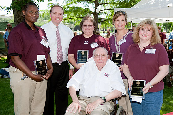 President Keenum with and President Emeritus Donald Zacharias 2010 Donald Zacharias Distinguished Staff Award recipients Linda Young, Brenda Edwards, Kacey Strickland, and Reatha Linley.