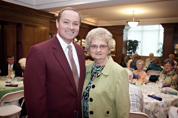 President Keenum with his Mother, Shirley Keenum, honoring her recent retirement as a librarian with a reception in the theme of this year's Maroon Edition reading choice, The Three Cups of Tea.