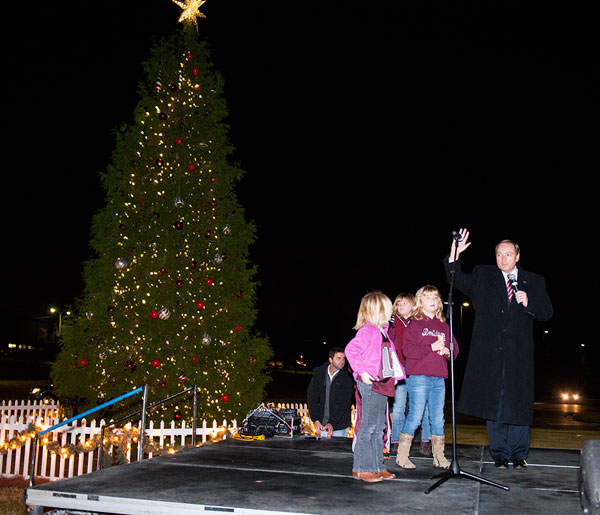 Dr. Keenum lights the MSU Christmas tree during the annual Holiday in the Junction ceremony.