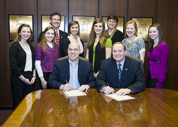 Mississippi State University President Mark E. Keenum, seated right, and Starkville Mayor Parker Wiseman have declared March to be National Nutrition Month at MSU and in the city.