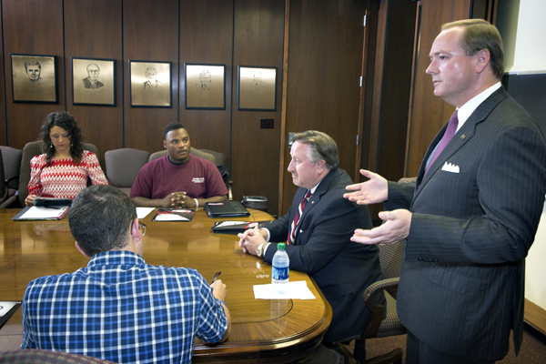 Lex Taylor, center, of Taylor Machine Works in Louisville, participates in MSU President Mark E. Keenum's Honors Seminar in Leadership class.
