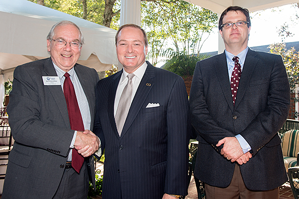From left to right: Jim Rosenblatt, Dean of the Mississippi College School of Law, President Mark Keenum, and Whit Waide, an MSU instructor in political science and public administration pose at a reception at the President's house following the legal ed