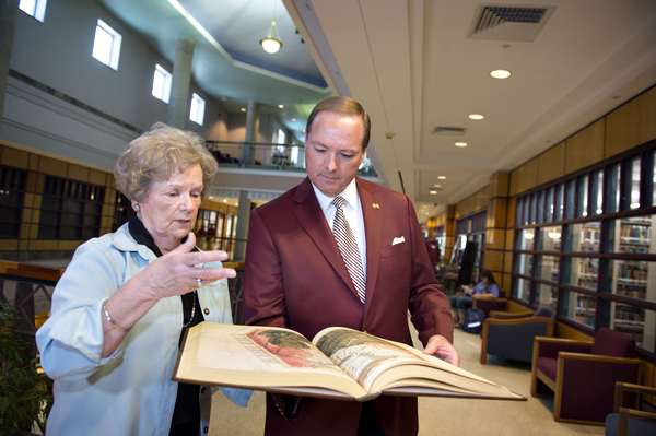 MSU President Mark E. Keenum recently presented MSU Libraries Dean Frances Coleman with a copy of Ptolemy's Cosmographia.