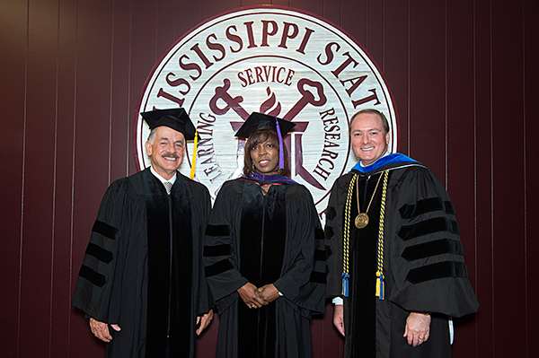 MSU President Mark E. Keenum, right, celebrates spring 2014 commencement exercises with Ertharin Cousin, executive director of the World Food Program, and Sebastian Barbosa, head of the cotton unit for the Brazilian Agricultural Research Corp.