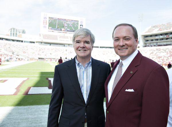 NCAA President Mark Emmert visits with MSU President Mark E. Keenum a few minutes before the kickoff of the Auburn-Mississippi State game.