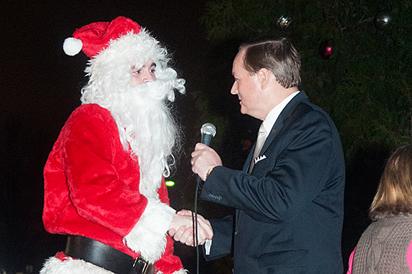 Santa Claus met with MSU President Mark E. Keenum moments before the Bulldog Family lit the Christmas tree at Holiday in The Junction on Monday night.