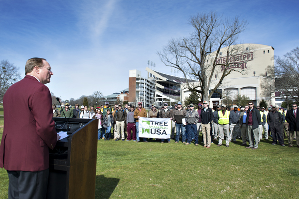 Mississippi State officials, along with members of the university's student chapter of the Society of American Foresters and the Campus Tree Advisory Committee, gathered today [Feb.