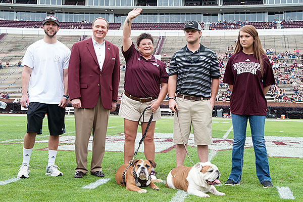 More than 21,000 Mississippi State fans came to Saturday’s Maroon and White game and watched as Jak, bottom center, became Bully XXI. He accepted mascot duties from his father, Bully XX known as “Champ,” bottom right.