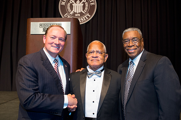 Dr. Richard E. Holmes, center, became the first African American student admitted to Mississippi State University in 1965.