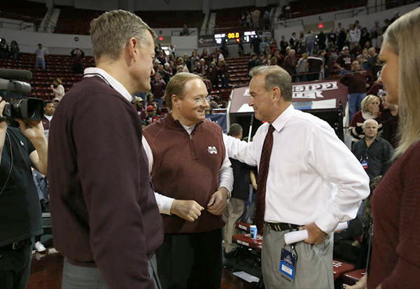 President Keenum and Scott Stricklin congratulating coach Vic Schaefer after the bulldogs defeated Michigan State Sunday to advance to the Sweet 16 in the NCAA Women's Tournament.
