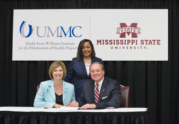 Mississippi State President Mark E. Keenum, right, and University of Mississippi Medical Center Vice Chancellor for Health Affairs Dr. LouAnn Woodward signed a Memorandum of Understanding today [April 18] to formalize a partnership addressing many of the
