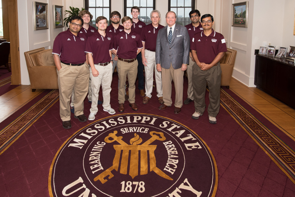MSU President Mark E. Keenum is pictured with members of MSU’s EcoCAR 3 team.
