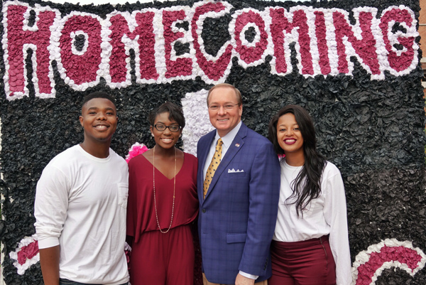 To begin Homecoming Week 2016, MSU President Mark E. Keenum, center, served up “Pancakes on the Plaza” with Malik Ross, left, homecoming director; Shawanda Brooks, queen; and Pyliceia “Fefe” Brown, co-director.