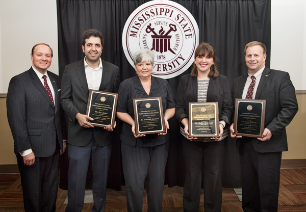 MSU President Mark E. Keenum (far left) congratulates the 2017 MSU Diversity Award winners during a March 23 campus ceremony.
