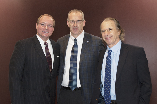 Mississippi State University President Mark E. Keenum visits with SEC Commissioner Greg Sankey and best-selling author John M. Barry during the 2017 SEC Academic Conference on Monday [March 27].