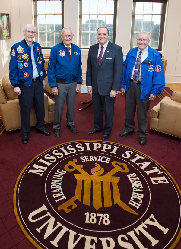 MSU President Mark E. Keenum visits with Apollo astronauts Fred Haise and Charlie Duke, and Apollo engineer and MSU alumnus Jerry Bostick on Wednesday [Oct.