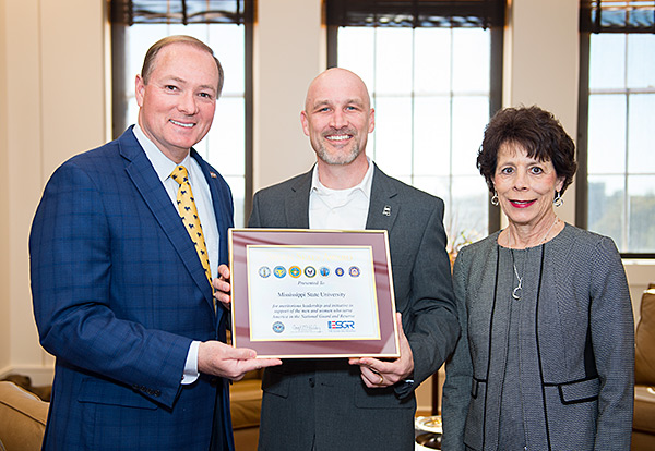 Mississippi State administrators are shown with the Seven Seals Award presented to the university in November by the Mississippi Employer Support of the Guard and Reserve (MSESGR).