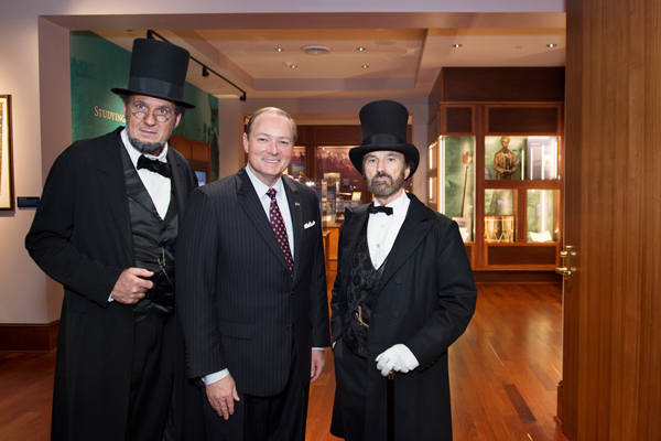 MSU President Mark E. Keenum poses with Abraham Lincoln and Ulysses S. Grant impersonators during the November grand opening of the Frank J. and Virginia Williams Collection of Lincolniana and the Ulysses S. Grant Presidential Library at Mitchell Memoria