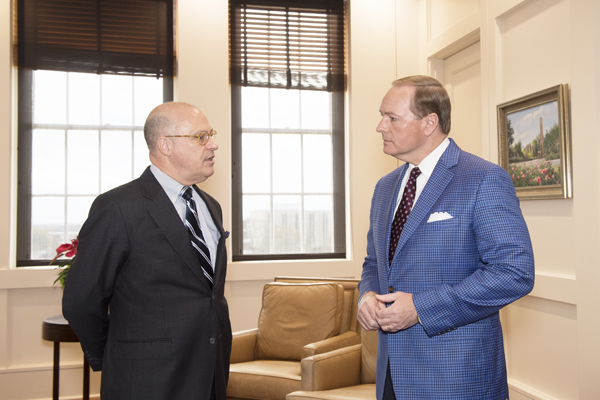 J. Christopher “Chris” Giancarlo, left, chairman of the U.S. Commodity Futures Trading Commission, visits with MSU President Mark E. Keenum during a  December meeting at the university.