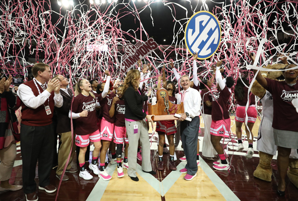 The Mississippi State women's basketball team celebrates clinching the 2017-18 SEC Championship after defeating Texas A&M on Feb.