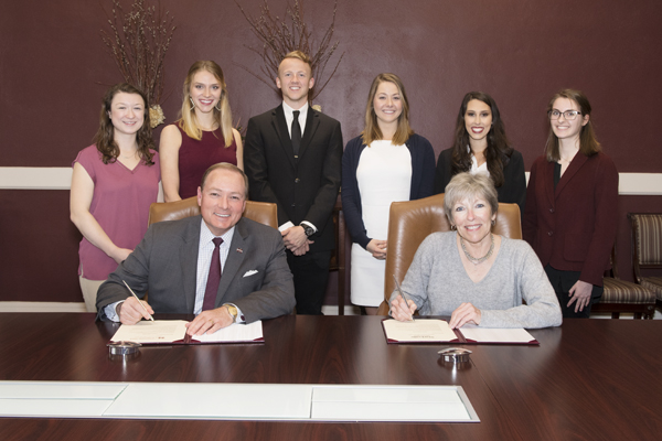 MSU President Mark E. Keenum and Starkville Mayor Lynn Spruill sign a proclamation announcing the city and campus observance of March as National Nutrition Month.