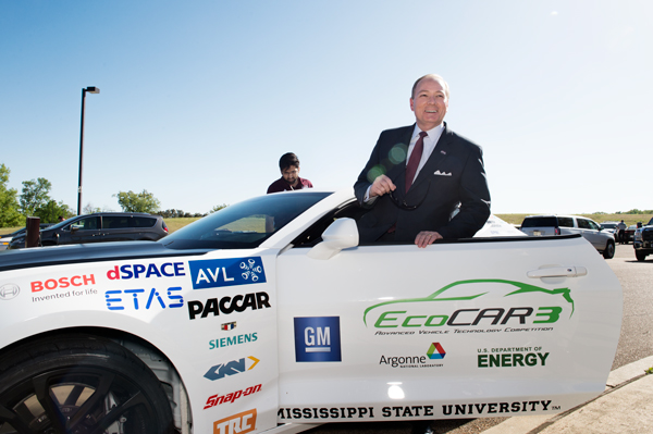 MSU President Mark E. Keenum gets ready to go for a ride in Mississippi State’s EcoCAR 3 competition vehicle.
