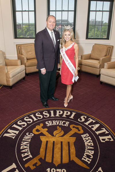 MSU President Mark E. Keenum congratulates Callie Brown, crowned Miss Mississippi State University in the fall of 2017, during a meeting in Lee Hall.