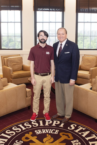 Mississippi State President Mark E. Keenum, right, meets with the university’s newest Goldwater Scholar, Nicholas A. “Nic” Ezzell.