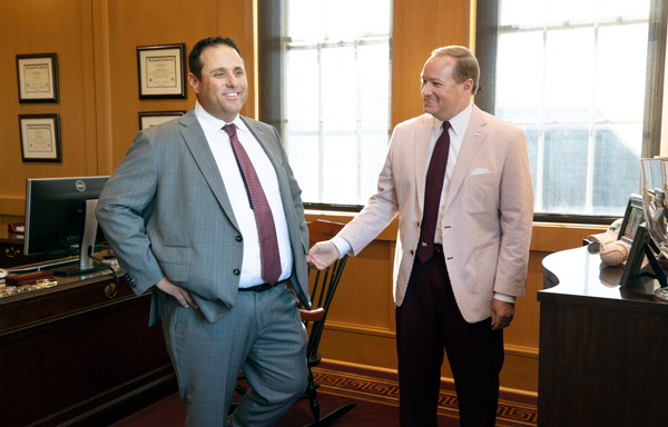 Mississippi State President Mark E. Keenum, right, meets with new MSU Head Baseball Coach Chris Lemonis before his introductory press conference Tuesday [June 26].