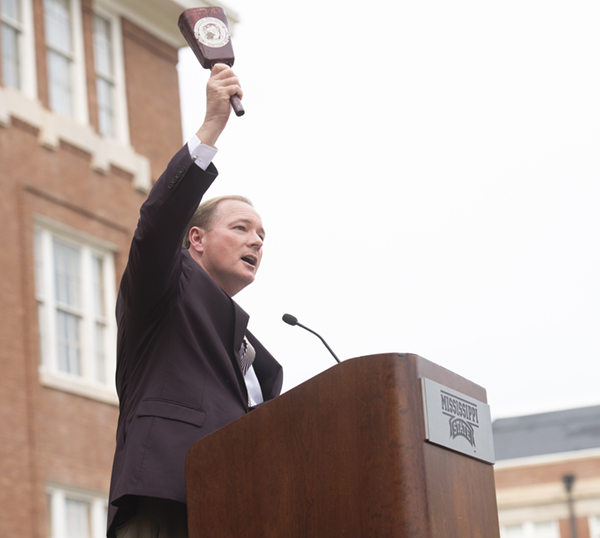 President Mark E. Keenum proudly rings his cowbell to welcome back students at this annual pep rally held in August.