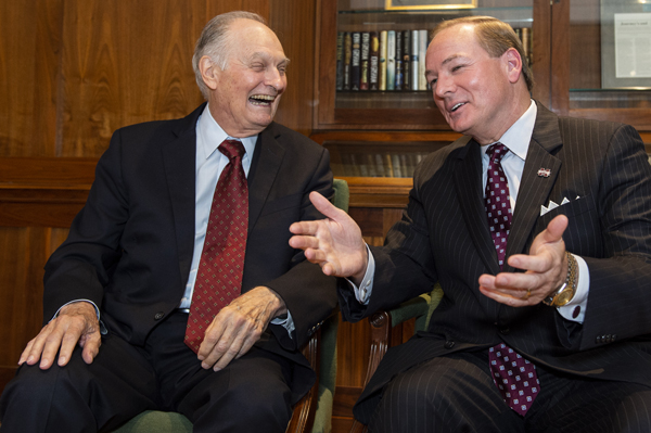 MSU President Mark E. Keenum shares a laugh with award-winning actor and author Alan Alda during a luncheon in the Grisham Room