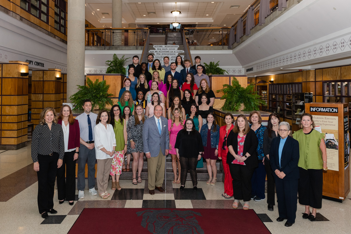 Students, Faculty, and Staff of METP with President Keenum in the Mitchell Memorial Library 