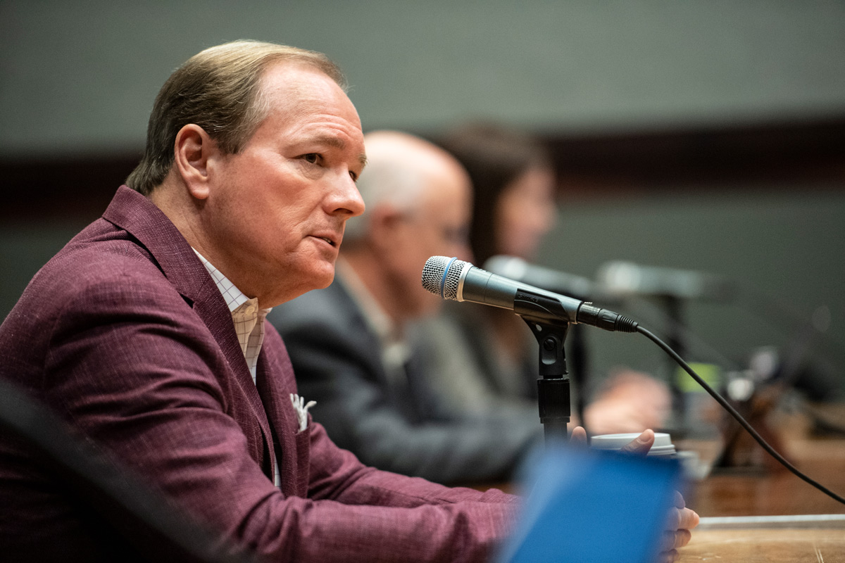 MSU President Keenum speaks speaks into a microphone during a March meeting of the university's COVID-19 Working Group.