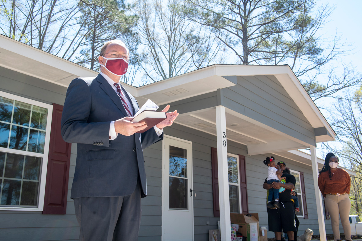 President Keenum speaks outside the newly built Habitat for Humanity Maroon Edition house