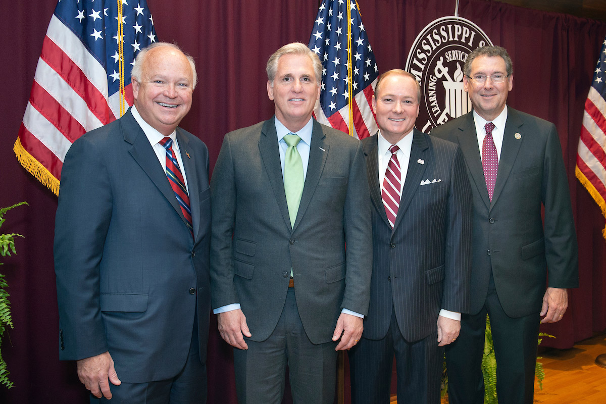 Current and former members of the U.S. House of Representatives with MSU President Mark Keenum