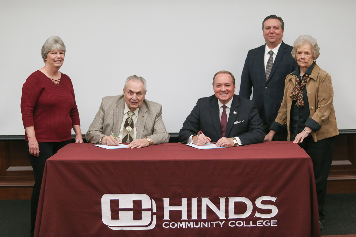 Hinds Community College President Muse and Mississippi State University President Keenum sign Library Partnership agreement.