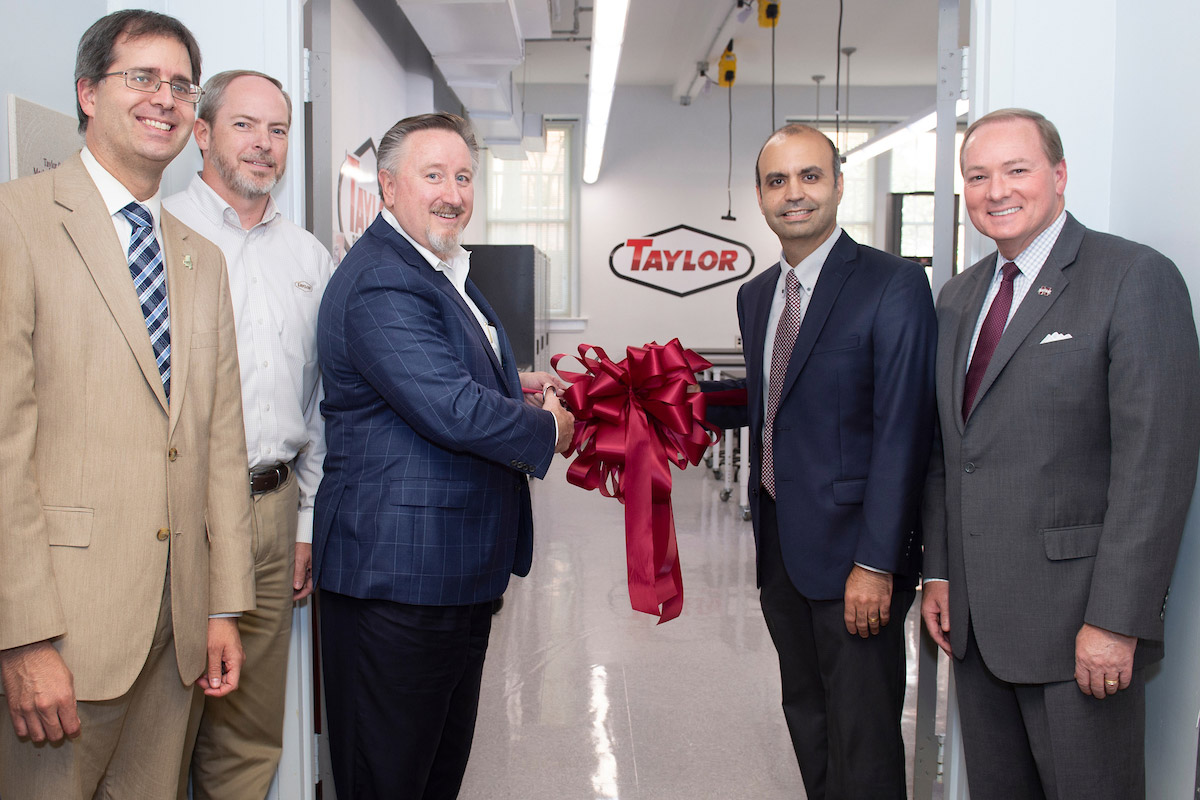 Celebrating a ribbon-cutting ceremony for the new Taylor Solid Mechanics Laboratory at MSU