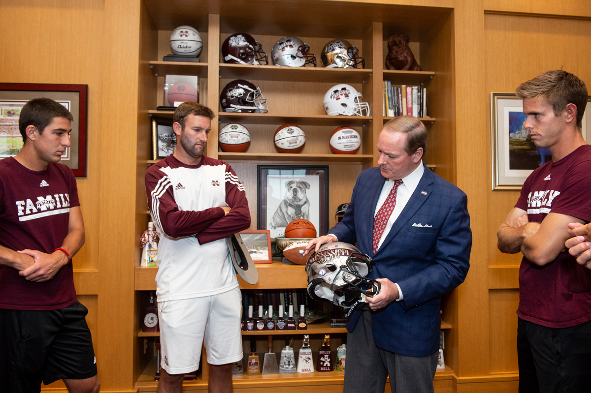 The MSU men's tennis team celebrated its 2019 SEC Tournament Championship in May by presenting the trophy to Dr. Mark Keenum.