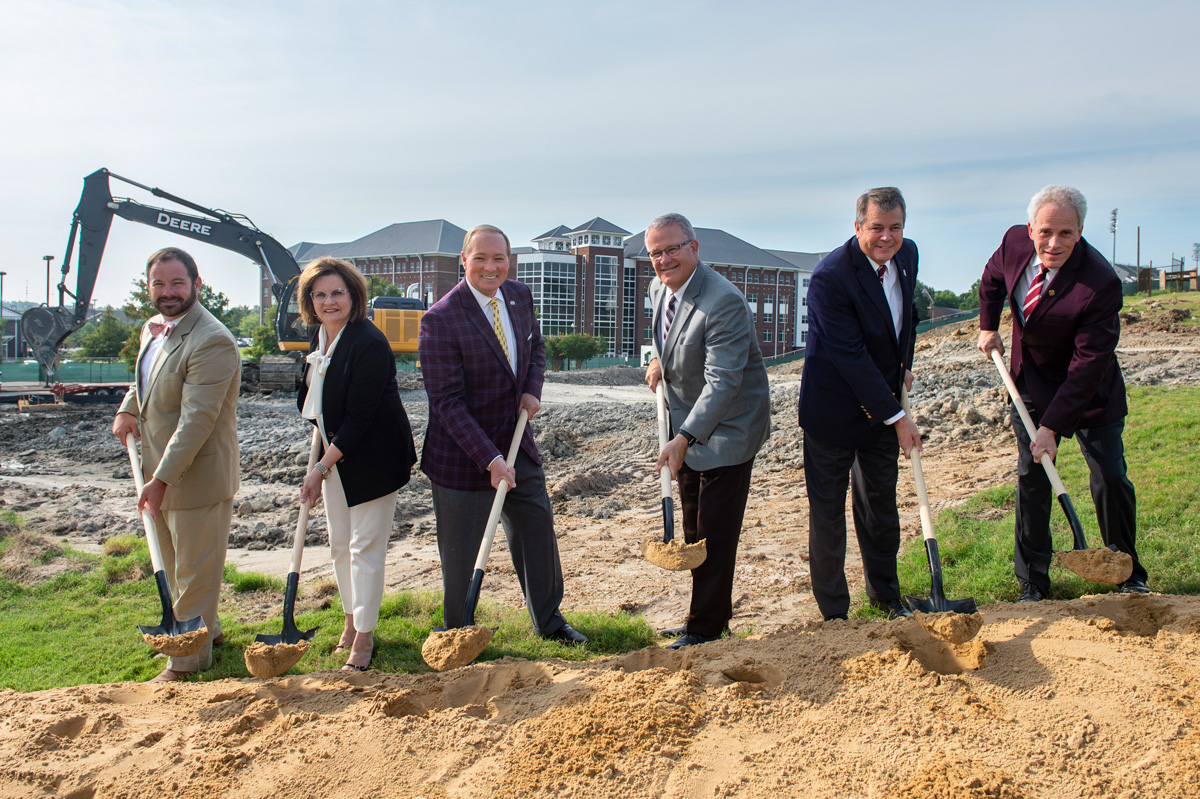 Mississippi State University officials broke ground Wednesday [Aug. 7] on a new 500-space parking garage.