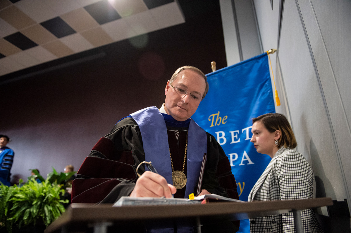 MSU President Mark E. Keenum signs the Phi Beta Kappa register of the new Gamma of Mississippi Chapter at MSU.