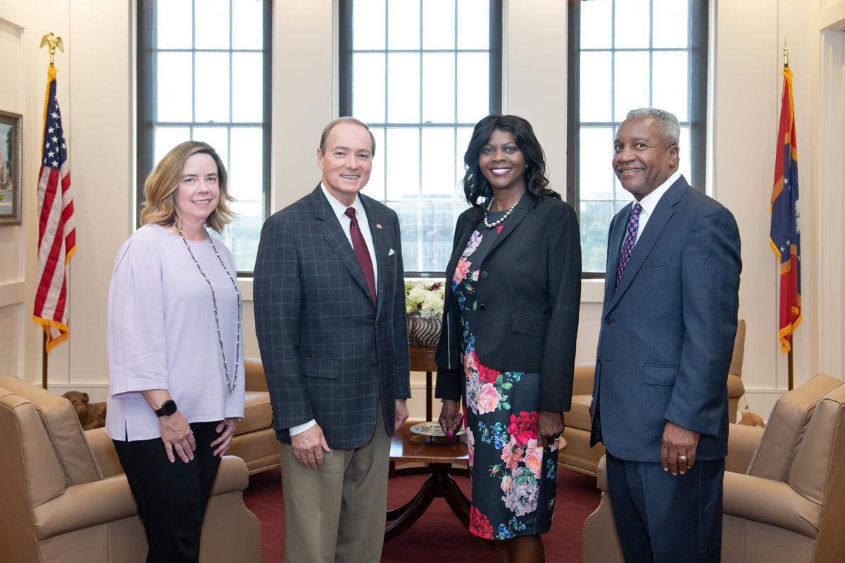 Pictured in President Keenum's office, L-R: are Sharon Drumm, President Keenum, Chavonda Jacobs-Young, and Archie Tucker.